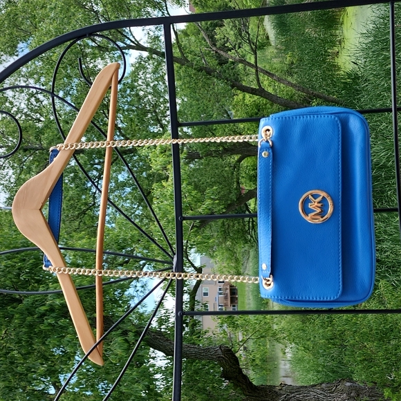 Michael Kors Handbags - Michael Kors Pebbled Leather Clutch/Purse in Blue, beautiful condition!